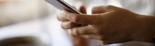 person_looking_at_phone_0